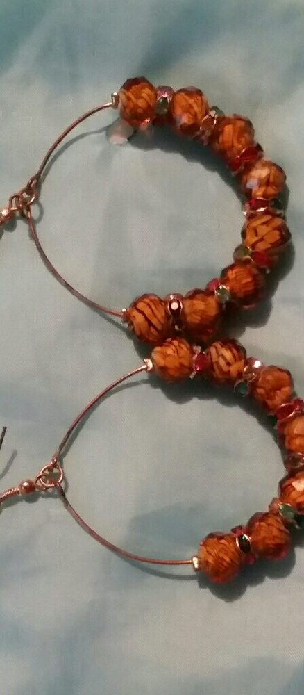 Large gold color hoop earrings brown large beads